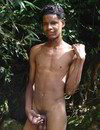Skinny 18 year old african guy strips naked in nature and displays his sausage