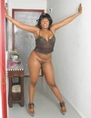 Black whore with big pierced nipples poses with no panties before shagging