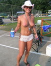 Pretty chicks strip at the wild fest and erotically shake nude melons and butts