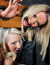 Super sexy lesbian woman with big boobs and long legs punishes a blonde