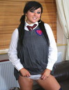 Fatty brunette in uniform and opaque stockings strips and plays with her fleshy 