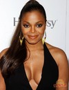 Sexy chocolate celebrity Janet Jackson appears in revealing dress in public and poses in bikini