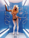 Fascinating blonde Pamela Anderson shows off her beautiful smile and big breatht