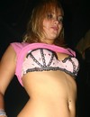 Young honey babes seductively taking off their clothes at the night party