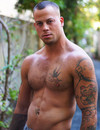 Two perfectly sculptured gay guys pose naked and please each other with their ha