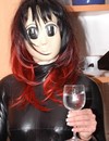 Flirtatious fetish model in skin tight rubber suit and mask does some modeling i