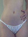 Lovely teen goldilocks Jen lays off her plaid skirt and shows her flat belly on