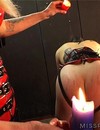 Blonde mistress in red and black latex outfit gives so much pain to her male slave