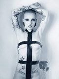 Wild bald bimbo friskily taking off her crazy lingerie and teasing with her tatt