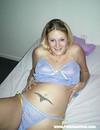 Pregnant chick takes off her blue lingerie and makes metal dildo disappear in her pussy