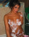 Naked latina chick shows off her wonderful tight ass and perky tits in the bath
