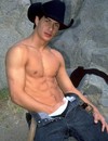 Strong guy in cowboy hat strips showing his perfect body and rock hard dick