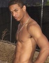 Black stud bares his navy uniform and jerks his cock until it splashes gooey wad