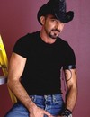 Brunet bear man in black hat shows his super sized cock while stroking it
