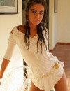Glamorous babe Verunka seductively poses in white tunic and strips off