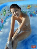 Naked cute asian kitty with itty bitty nipples takes a bubble bath outdoors