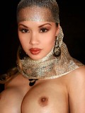 Big boobed glammed up asian strips out of her black fishnet body stocking