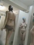 Unsuspecting amateurs with natural tits and trimmed pussies caught taking a shower