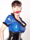 Harlot busty fem with a gag in her mouth has her wrists tightly restrained
