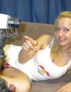 18 year old blond chick with playful eyes poses clothed for your enjoyment
